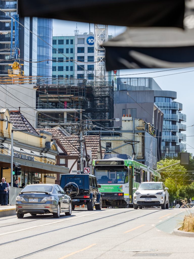 Always moving.

A tram rolls through. Cars inch forward. People come and go -  coffees in hand, somewhere to be.

South Yarra doesn’t really stop. It just… keeps going. And that’s exactly why people love it.