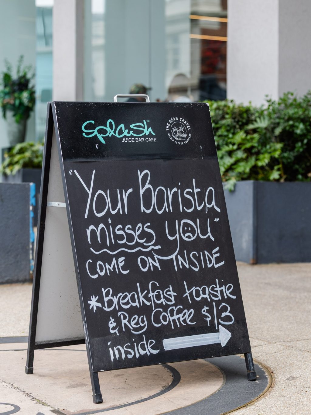 A sign from Splash Juice Bar & Café that says it all:
“Your barista misses you.”

If you needed a nudge to stop in for a coffee, this is it.
Breakfast toasties, fresh brews and friendly faces waiting just inside.

#ToorakRoadSouthYarra #SouthYarraEats #SplashJuiceBarAndCafe