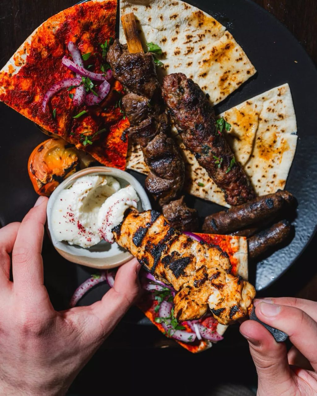Mosaic Melbourne serves up a feast of chargrilled chicken, kofta, and lamb skewers, paired with smoky vegetables and freshly made Antakli bread.

📍304 Toorak Road South Yarra

📷 (c) @mosaicmelbourne